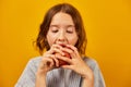 Pretty teen girl, child eat, bites a fresh red apple Royalty Free Stock Photo