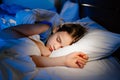 The pretty teen girl naps in bedroom, sees sleep. healthy sleep. Royalty Free Stock Photo