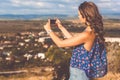 Pretty teen girl taking selfie by phone Royalty Free Stock Photo