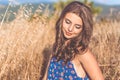 Pretty teen girl in yellow autumn field Royalty Free Stock Photo