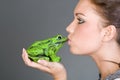 Pretty Teen Kissing a Frog