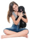 Pretty teenage girl hugging her pet dog Royalty Free Stock Photo