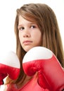 Pretty teenage girl with red boxing gloves Royalty Free Stock Photo