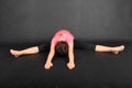 Teenage girl in sportswear exercising yoga Royalty Free Stock Photo