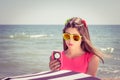 Pretty teenage girl in suglasses and in a pink dress Royalty Free Stock Photo