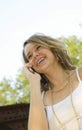 Pretty Teenage Girl talking on mobile phone Royalty Free Stock Photo