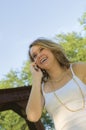 Pretty Teenage Girl talking on mobile phone Royalty Free Stock Photo