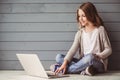Teenage girl with a laptop Royalty Free Stock Photo