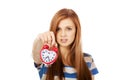 Pretty teenage woman with alarmclock Royalty Free Stock Photo