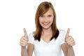 Pretty teenager gesturing double thumbs up Royalty Free Stock Photo