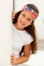 Pretty teenager girl with a flowered headband Royalty Free Stock Photo