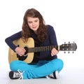 Pretty teenager girl music on acoustic guitar Royalty Free Stock Photo