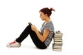 Pretty teenager girl sit on floor and reading book Royalty Free Stock Photo