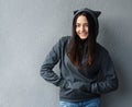 Pretty teenager girl smiling in hoodie Royalty Free Stock Photo