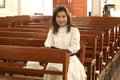 Pretty Thai woman study bible .