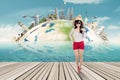 Pretty traveler with the world monument background Royalty Free Stock Photo