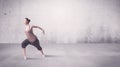 Pretty urban dancer with empty background Royalty Free Stock Photo