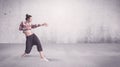 Pretty urban dancer with empty background Royalty Free Stock Photo