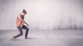 Pretty urban dancer with empty background Royalty Free Stock Photo