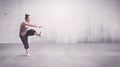 Pretty urban dancer with empty background Royalty Free Stock Photo