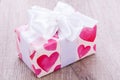 Pretty Valentines gift with hearts on the giftwrap