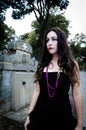 Pretty vampire near charnel house Royalty Free Stock Photo