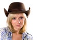 Pretty western woman in cowboy shirt and hat Royalty Free Stock Photo