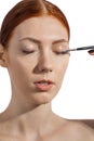 Pretty Woman Applying Eye Shadow Makeup Royalty Free Stock Photo