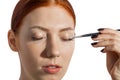 Pretty Woman Applying Eye Shadow Makeup Royalty Free Stock Photo