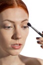 Pretty Woman Applying Eye Shadow Makeup Royalty Free Stock Photo