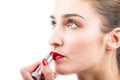 Pretty woman applying lip gloss make up Royalty Free Stock Photo