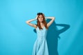 pretty woman blue dress glamor attractive look what to do Studio Royalty Free Stock Photo