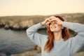 pretty woman in blue sweater enjoy nature fresh air freedom Royalty Free Stock Photo