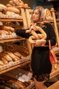 Pretty woman in the bread depatment