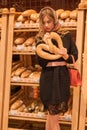 Pretty woman in the bread depatment