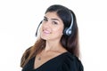 Pretty woman in call center smiling cheerful support phone operator portrait in phone headset business office Royalty Free Stock Photo