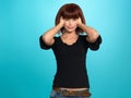 Pretty woman covering her ears Royalty Free Stock Photo