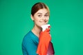 pretty woman with detergent cleaning service green background