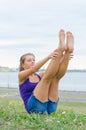 Pretty woman doing exercises for the abs. Royalty Free Stock Photo