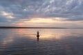 Pretty woman doing yoga at sunset outdoors Royalty Free Stock Photo