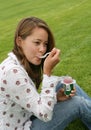 Pretty Woman Eating Yogurt Royalty Free Stock Photo