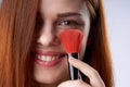 pretty woman face closeup makeup brush glamor Royalty Free Stock Photo