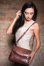 Pretty woman with handbag Royalty Free Stock Photo