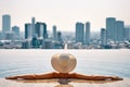 Pretty woman in hat relax in swimming pool on roof top enjoy cityscape panorama view Royalty Free Stock Photo