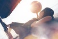 Pretty woman with hat resting under sun shelter on the beach Royalty Free Stock Photo