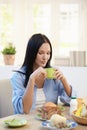 Pretty woman having breakfast Royalty Free Stock Photo