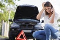pretty woman having problem with car on road Royalty Free Stock Photo