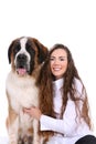 Pretty woman and her Saint Bernard dog side by sid