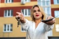 Pretty woman holding keys to new house Royalty Free Stock Photo