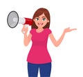 Pretty woman holding a megaphone/loud speaker and showing hand to copy space away. Girl making announcement with megaphone. Royalty Free Stock Photo